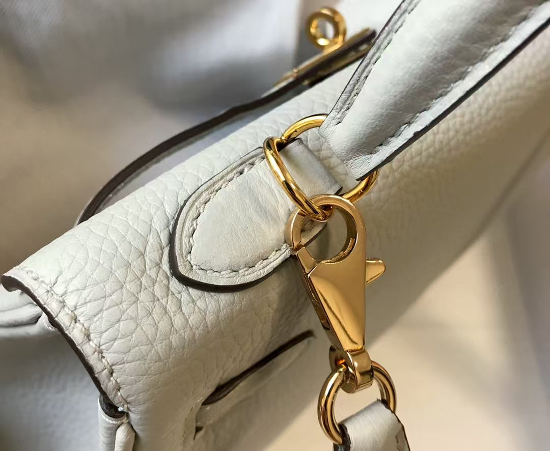 Hermès Kelly 25 Retourne Swift Leather in White Pre-Owned Authentic