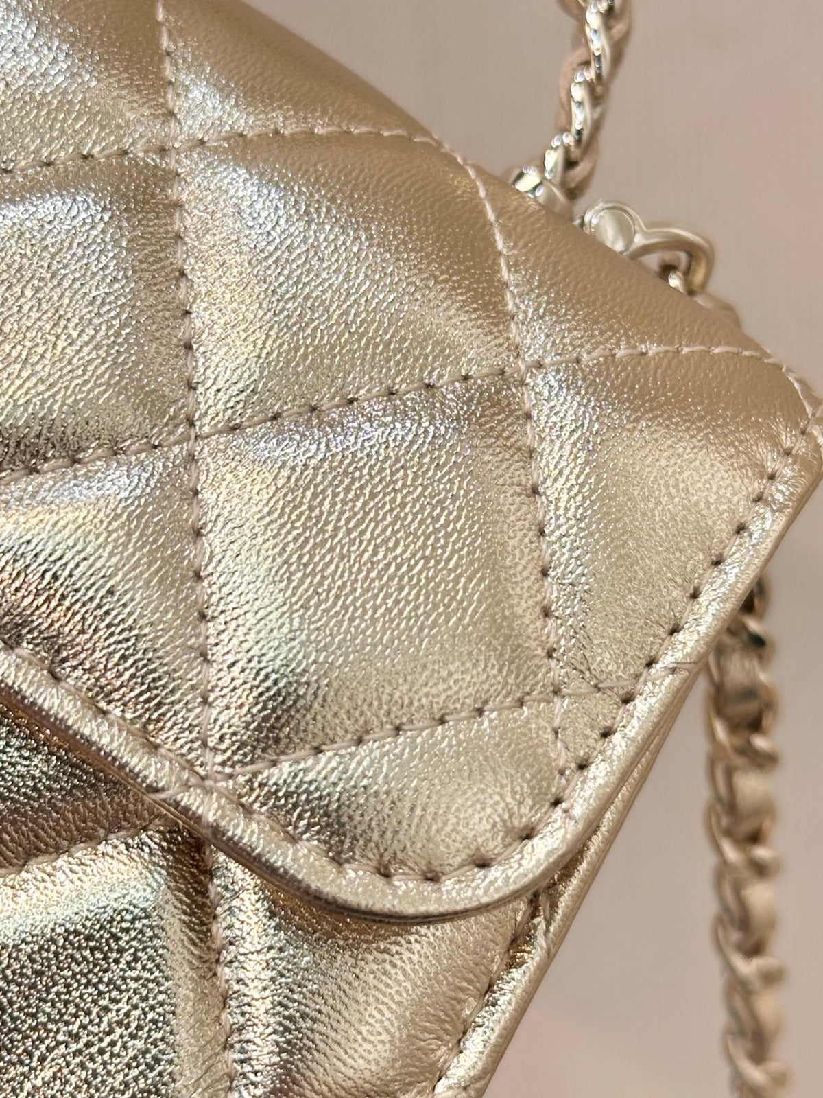 Chanel Clutch on Chain with Top Handle  in Champagne Gold leather detail