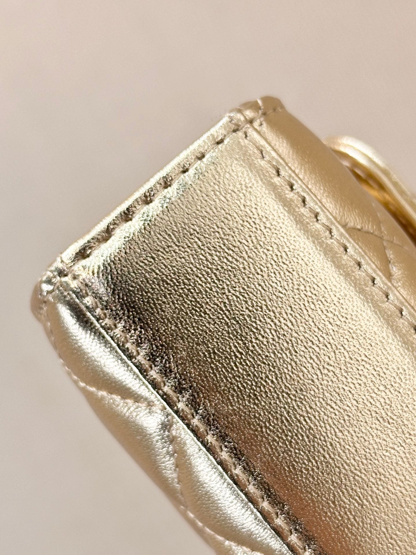Chanel Clutch on Chain with Top Handle  in Champagne Gold bottom view