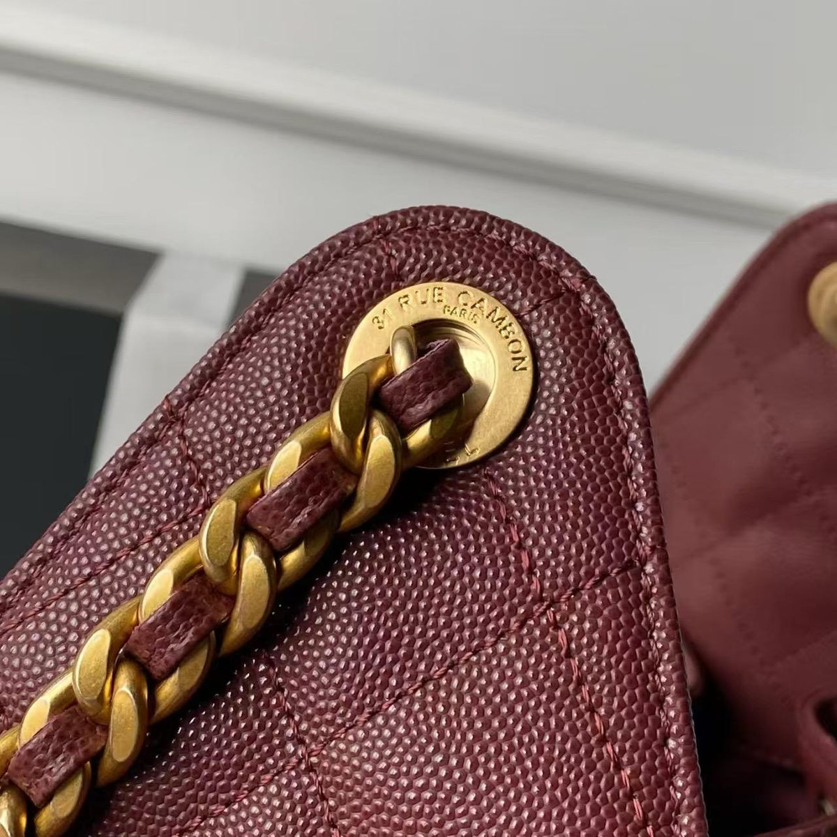Chanel 25 Small Hobo – Burgundy Calfskin  side hardware details