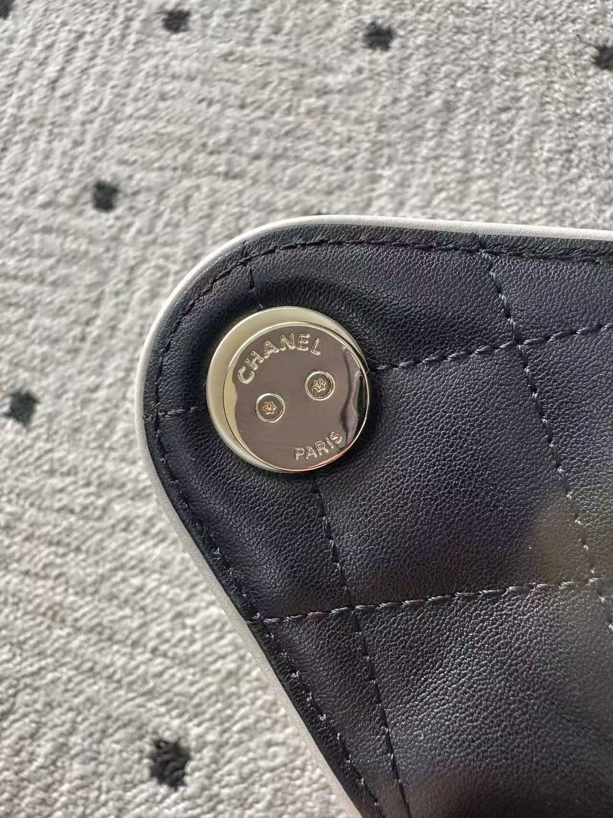 Chanel 25 Small Hobo gold-tone hardware detail