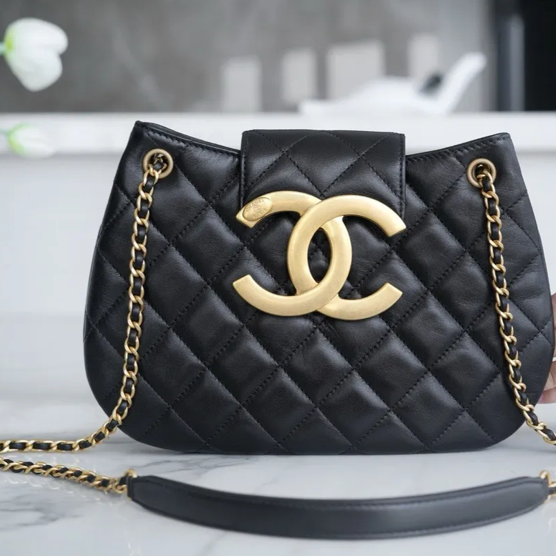 re-Owned Authentic Chanel Lambskin Quilted CC Messenger Black Bag