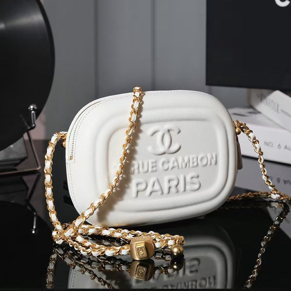 Pre-Owned Authentic Chanel Shiny Lambskin Mini Camera Bag