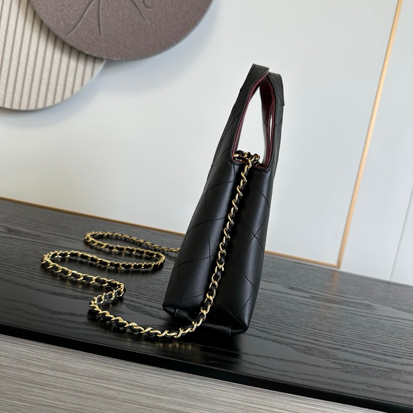Chanel black calfskin shopping bag side view