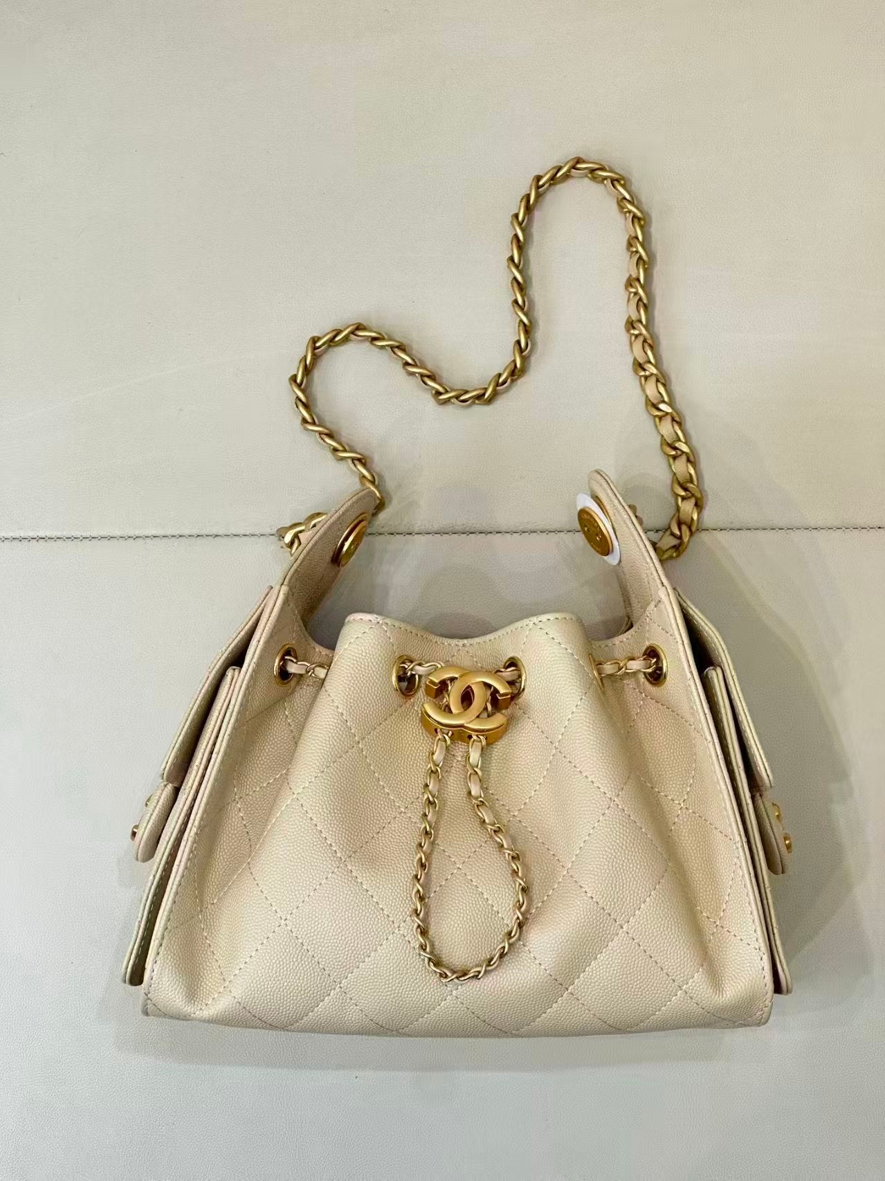 Pre-Owned Authentic Chanel 25 Small in Ivory White