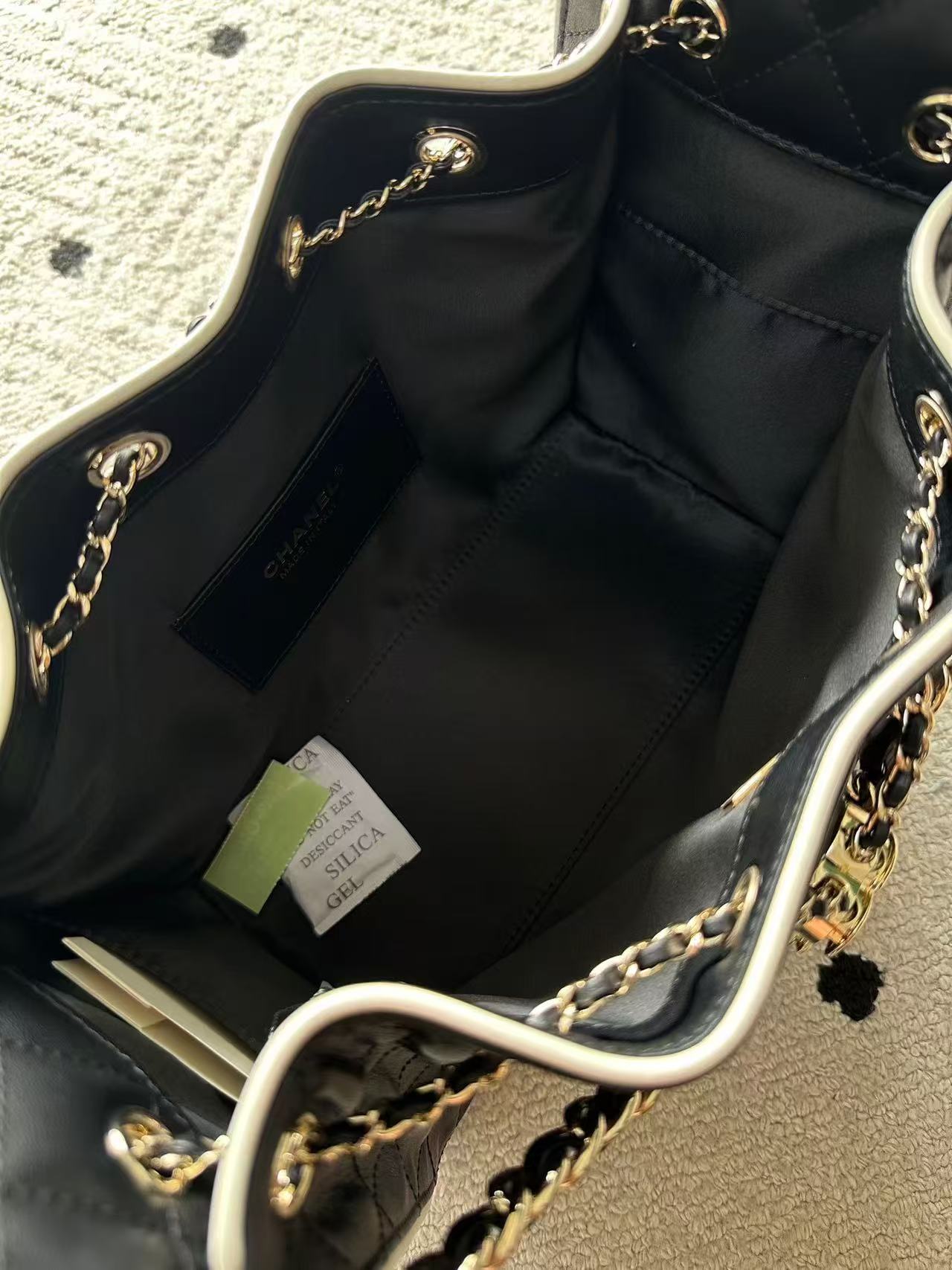Pre-Owned Authentic Chanel 25 Small AS5293 in Calfskin & Gold-Tone Metal  Black & White