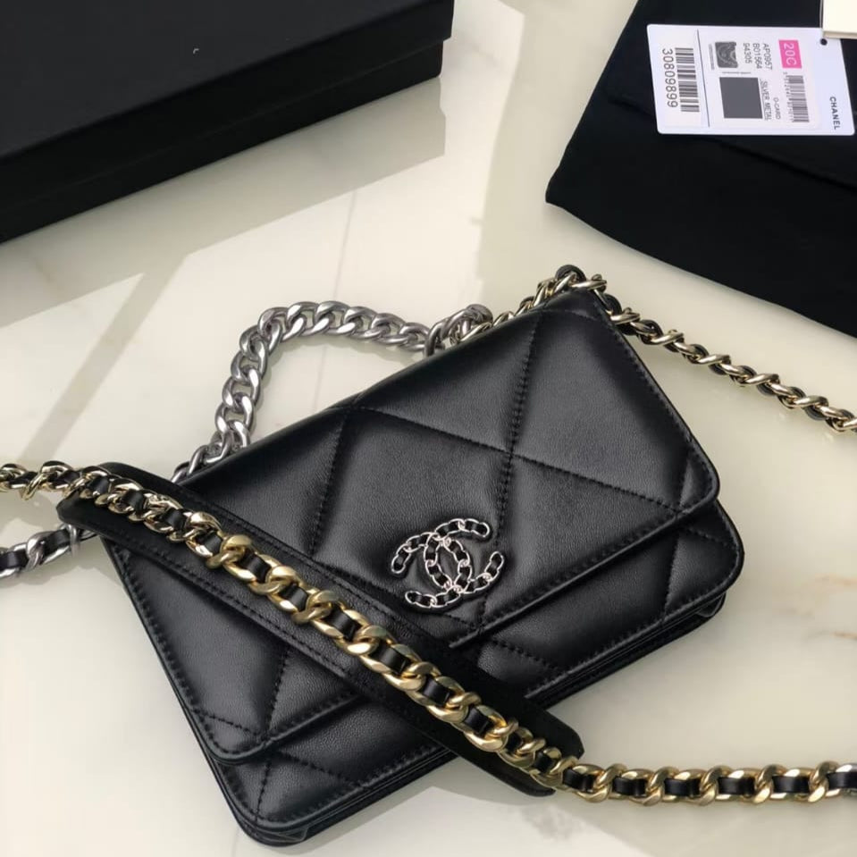 Pre-Owned Authentic Chanel 19 Wallet on Chain (WOC)  Black Lambskin Quilted