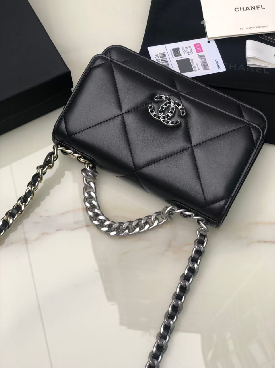 Pre-Owned Authentic Chanel 19 Wallet on Chain (WOC)  Black Lambskin Quilted