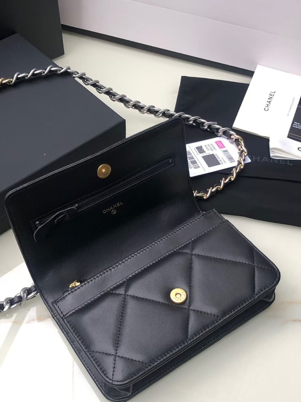 Pre-Owned Authentic Chanel 19 Wallet on Chain (WOC)  Black Lambskin Quilted