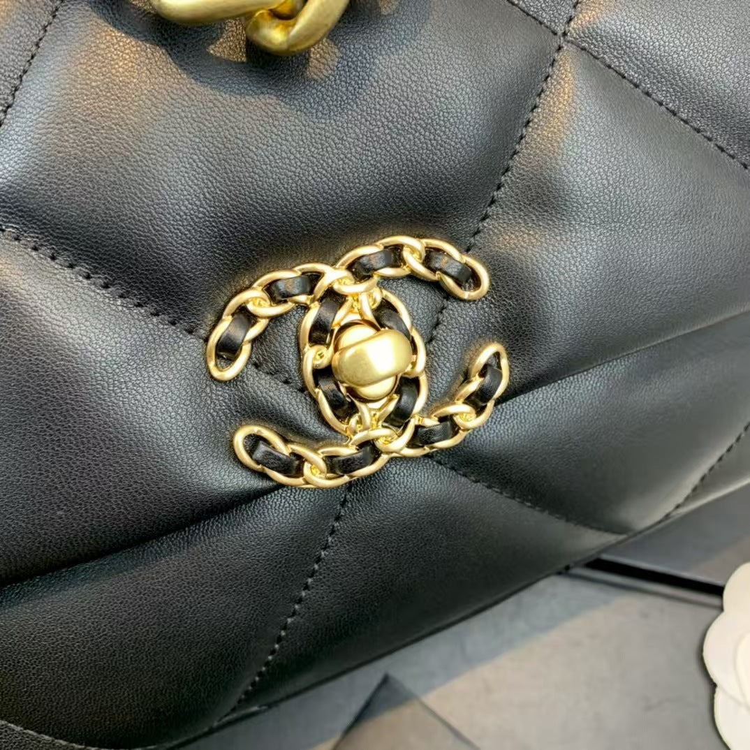 Pre-Owned Authentic Chanel Medium Backpack  Black Grained Shiny Calfskin