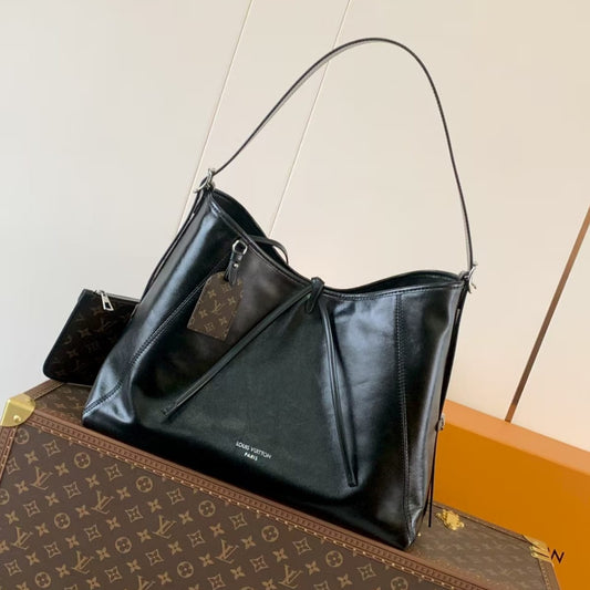 Pre-Owned Authentic Louis Vuitton Carry All Vibe MM – Lambskin Leather, Palladium Hardware
