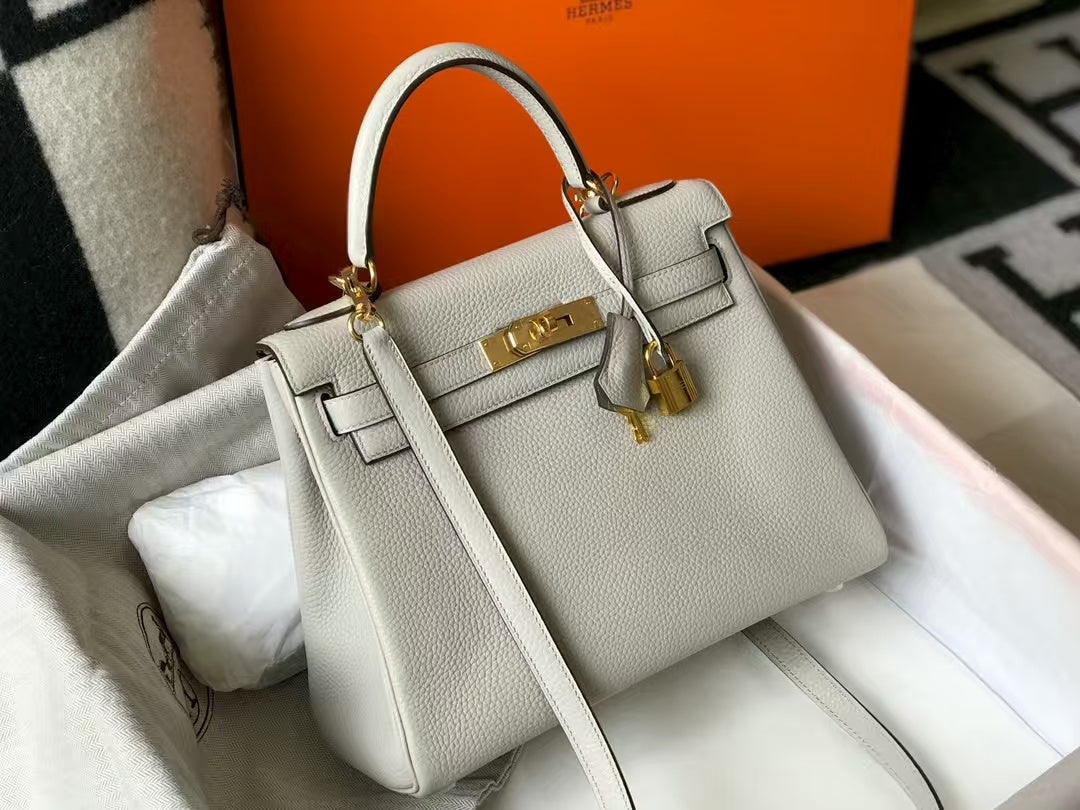 Hermès Kelly 25 Retourne Swift Leather in White Pre-Owned Authentic