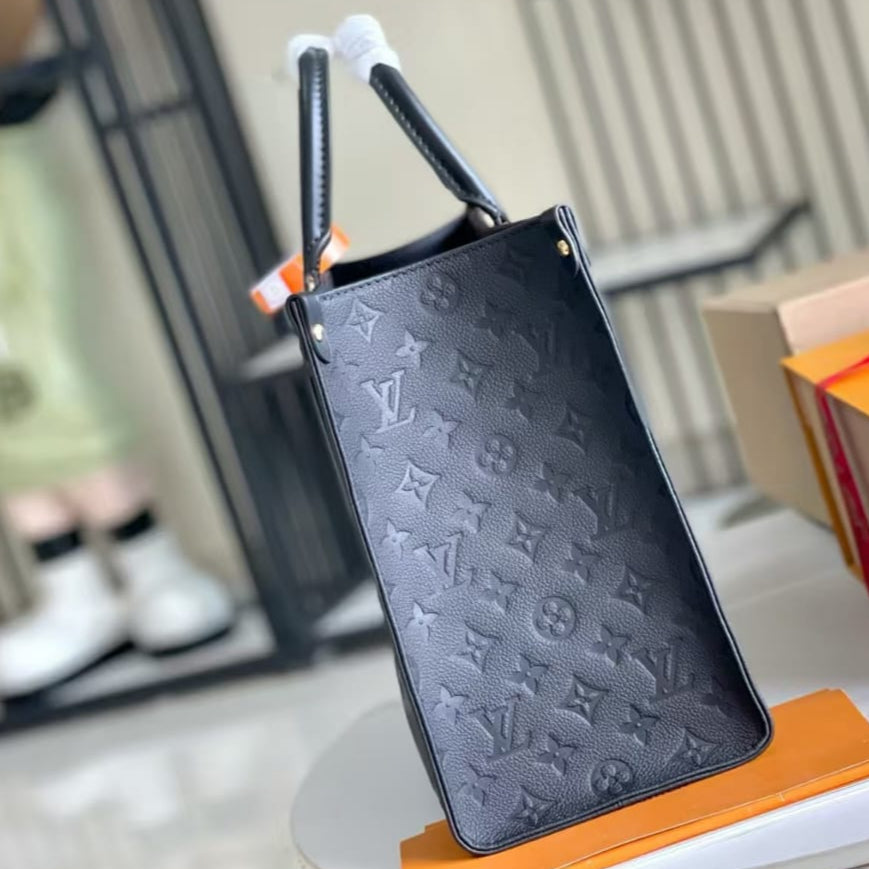 Pre-Owned Authentic Louis Vuitton OnTheGo MM Black